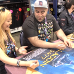 Jessica Norstrom, David Qasawa, Ric Viers and Erik Steele sign Aladdin 3477 posters at the Star Wars Celebration in Anaheim, California.