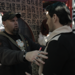 Matt Busch directs John Rick on one of the Hong Kong sets.