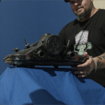 Matt Busch preps a miniature of the 8L4CK5T4R Dropship.