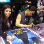 Actress Christi Perovski and Actor James Polony signing posters and trading cards at the Star Wars Celebration in Orlando, FL, to promote ALADDIN 3477.
