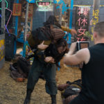 Actress/Producer Lin Zy flips martial arts choreographer Daniel Khalil, captured by Director of Photography Alexander Jacobson during an intense fight scene. Photo by Frank Lombardo.